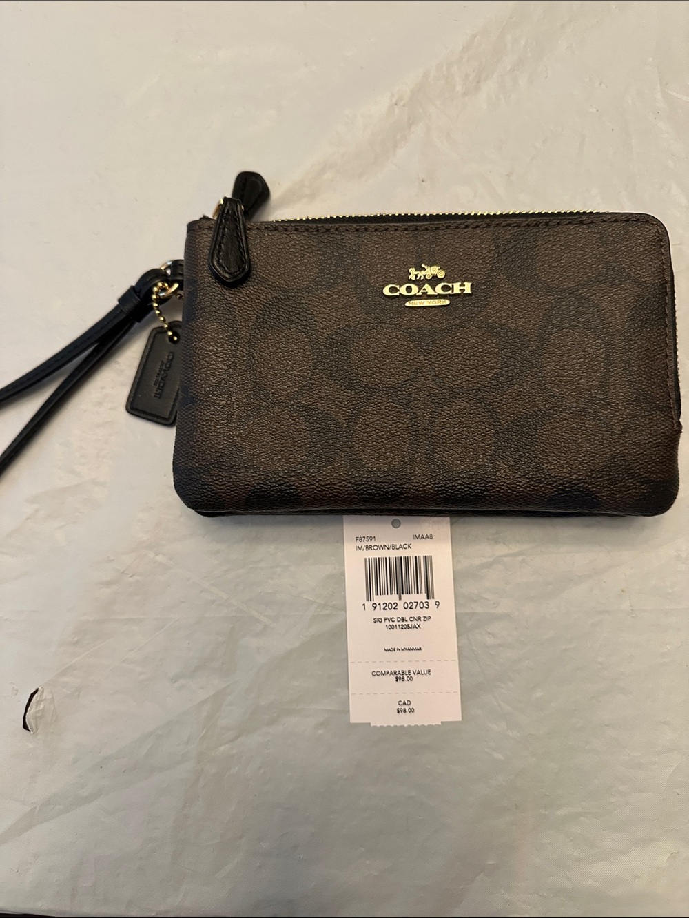 Coach Brown and Black Signature PVC Zip Wristlet with Gold Logo